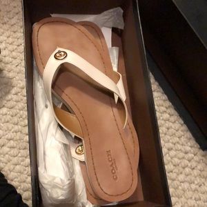 Coach slip ons